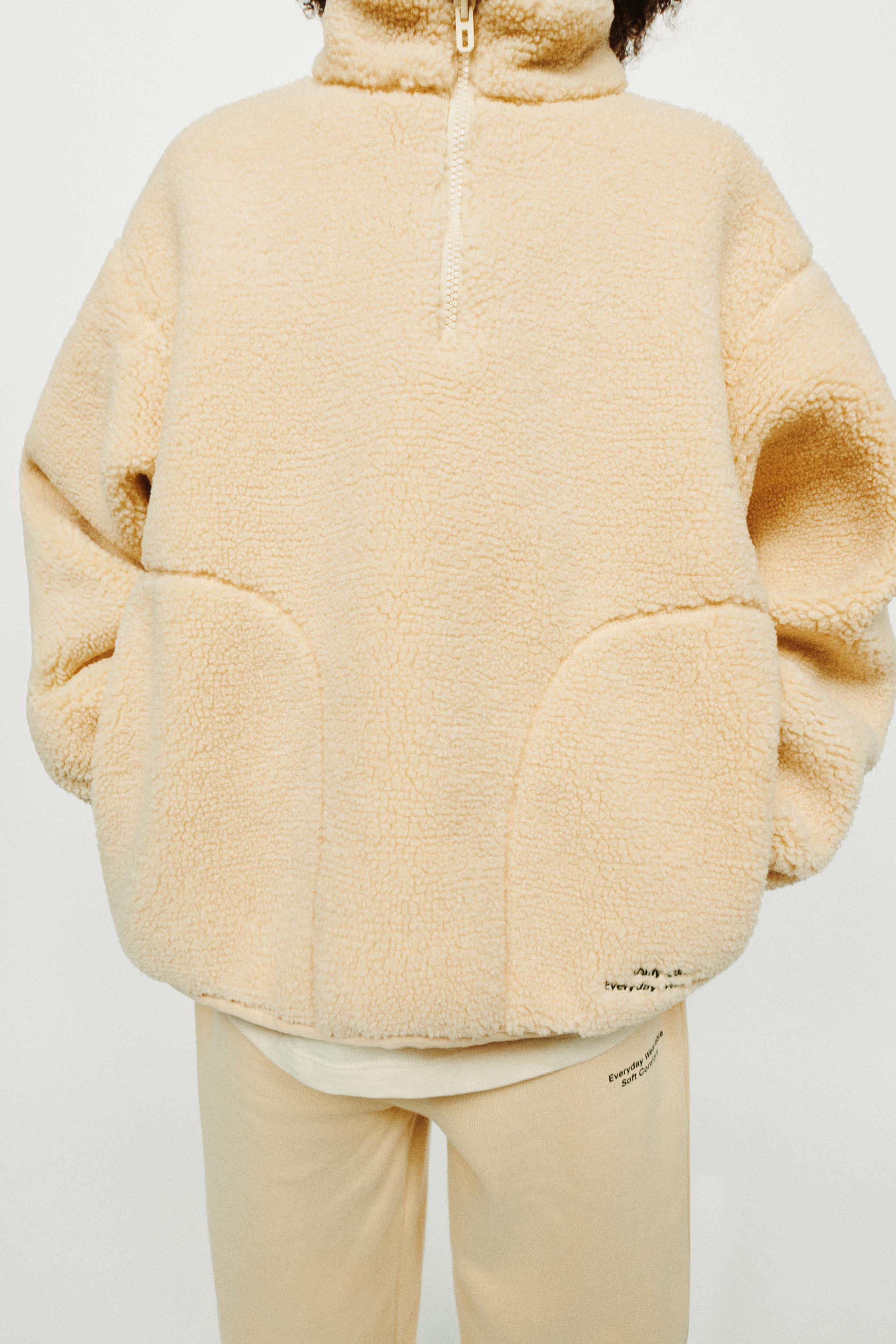 ZIP FAUX SHEARLING SWEATSHIRT